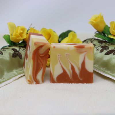 Our By the Sea Soap Shoppe "Autumn Leaves" bar soap is white with yellow and red swirls. Scent reminds you of crispy fall leaves in the park and apple trees. Castor oil included for extra moisturizing. Natural ingredients, vegan, handmade in Prince Edward Island, Canada. $7.00 each, 3 for $20.00