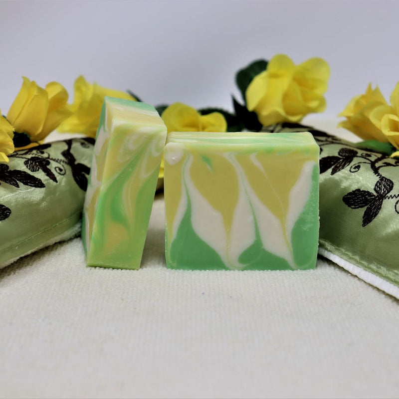 By the Sea Soap Shoppe bar soap "Lemon Sage and Ginger" mini soap is the perfect size for travel. Bar is white with a yellow and green leafy design. Fragrance is lovely, with lemongrass, sage, ginger and geranium. Vegan, natural ingredients, moisturizing, lathering. Handmade in Prince Edward Island, Canada. $3.00 each