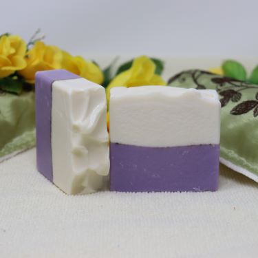 By the Sea Soap Shoppe "Spearmint Lavender" soap has Spearmint essential oil and Lavender essential oil which are both stress relieving and soothing. Soap is purple and white; purple on the bottom half and white on the top half. Moisturizing, vegan, natural products. And the scent is wonderful! $7.00 each, 3 for $20.00. Handmade in P.E.I. 
