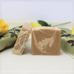 By the Sea Soap Shoppe "Great Goat mini soap" is a travel size bar made with goat milk instead of water. The bar is light brown with off white swirls. It is pleasantly scented with a "Honey, Milk and Oatmeal" fragrance. Natural ingredients, good for your skin, moisturizing. $3.00 each.