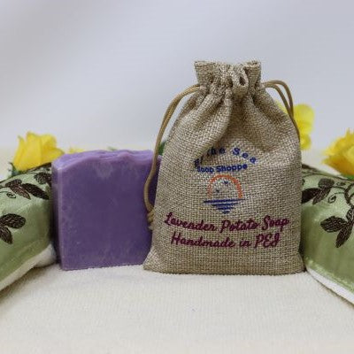 Our By the Sea Soap Shoppe "Lavender Potato Soap" is made with potato water. The potato water adds nutrients which are good for your skin. We've added lavender essential oil with its soothing, stress relieving benefits. Purple colour. $7.00 each, 3 for $20.00. 