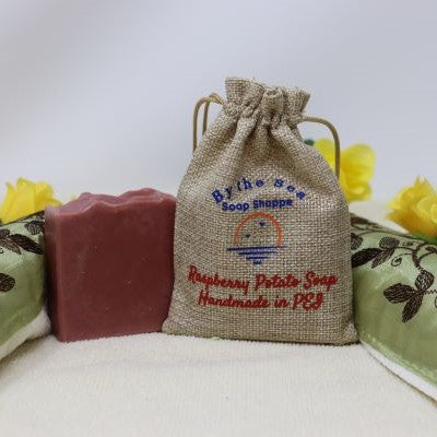 Our By the Sea Soap Shoppe Raspberry Potato soap is a reddish brown colour and is scented with a Raspberry fragrance. We use potato water in the soap which give your skin vitamins and minerals from the potato water. Handmade in Prince Edward Island. Moisturizing, natural ingredients, vegan. $7.00 each, 3 for $20